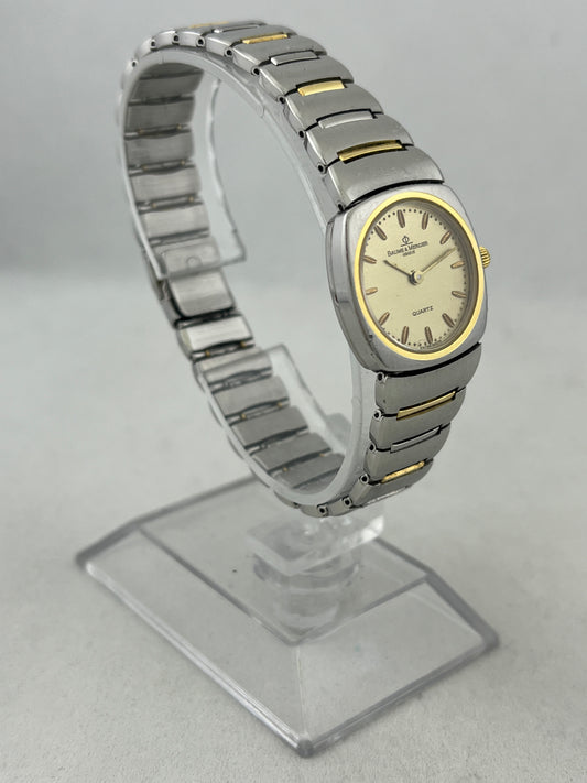 Baume & Mercier Cuarzo con eslabones de oro de 18 quilates y bisel de oro